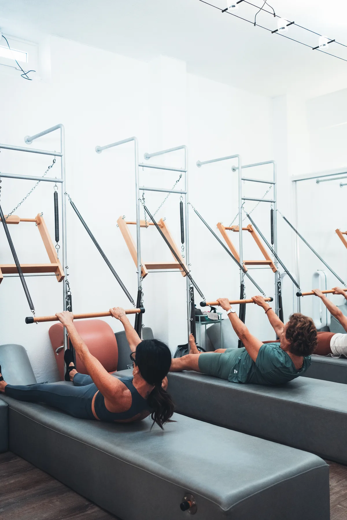 Rolling back exercise in the Mat Wall class